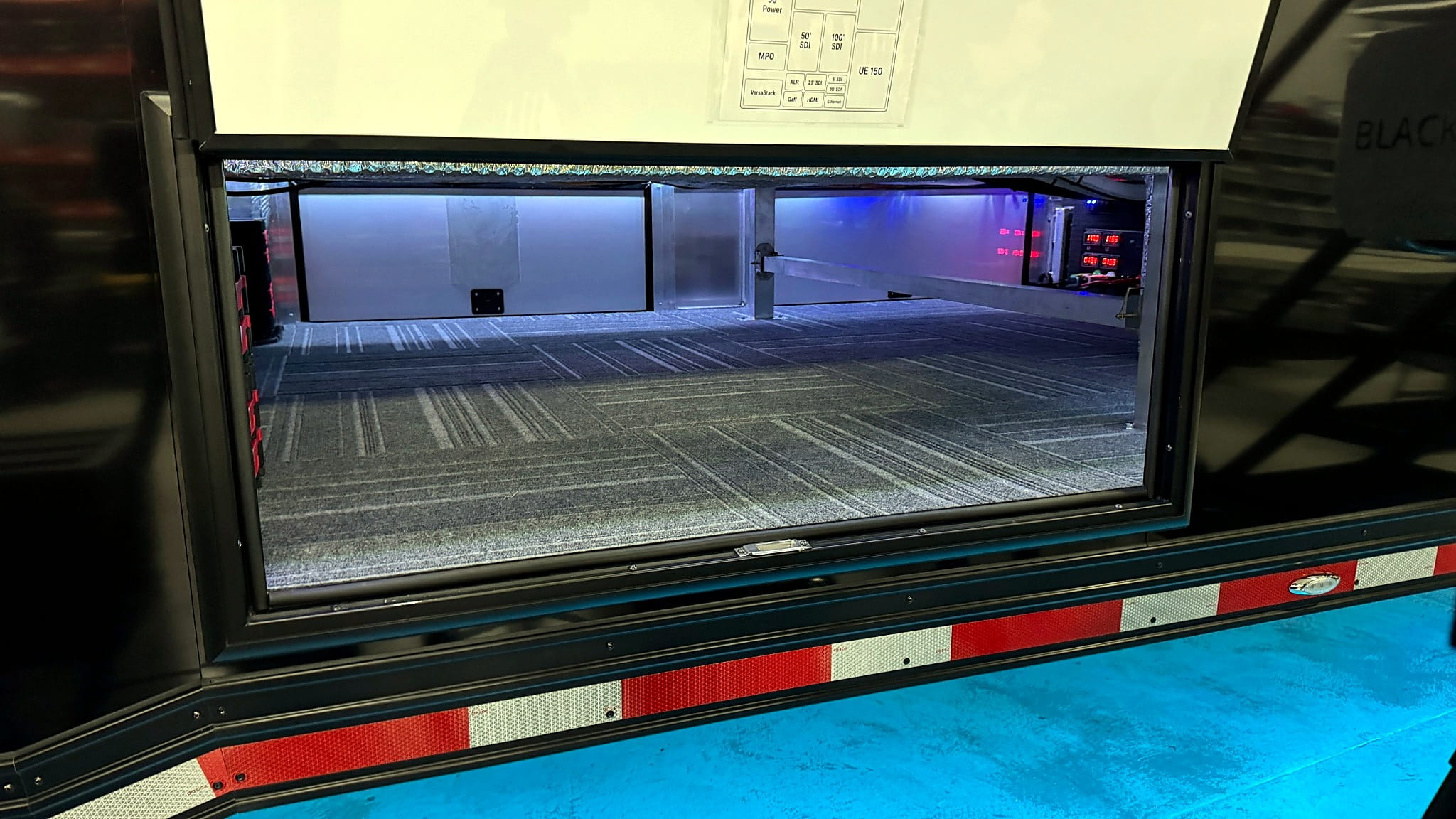 Exterior access to the illuminated equipment bay